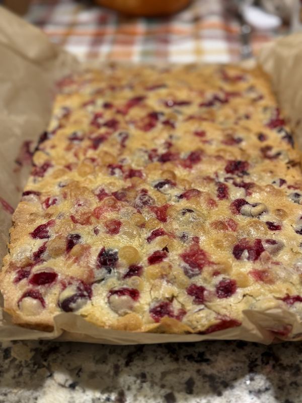 Cranberry and white chocolate bars fresh from the pan